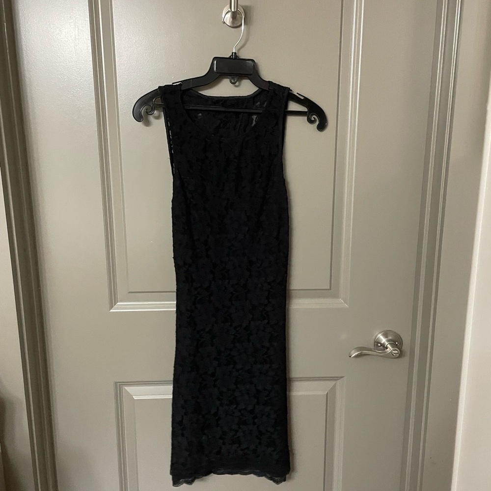 Never worn black lace Express dress in size XS.
